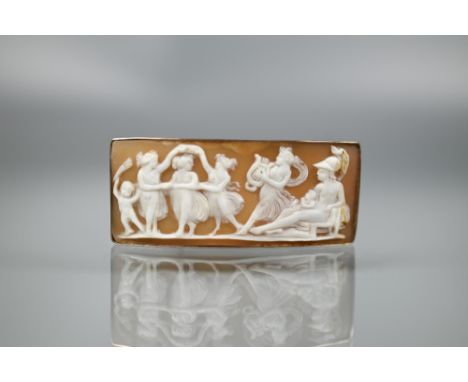 A shell cameo rectangular brooch featuring a classical frieze of figures dancing to harp player, plain rose gold mount, 6 x 2