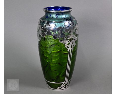 A Loetz Art Nouveau 'Titania' cobalt blue glass vase with iridescent green marbling and stylised floral silver overlay, stamp