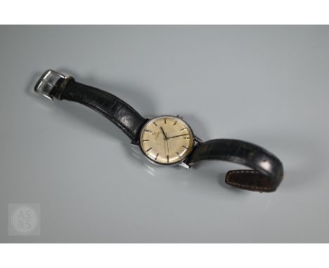 A Vintage Omega Seamaster wristwatch, the 32 mm stainless steel case with silvered dial and baton markers, seconds sweep, on 