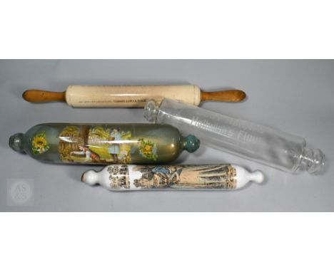 A Victorian glass rolling pin with internal printed scraps including Queen Victoria and another with print of boys catching b