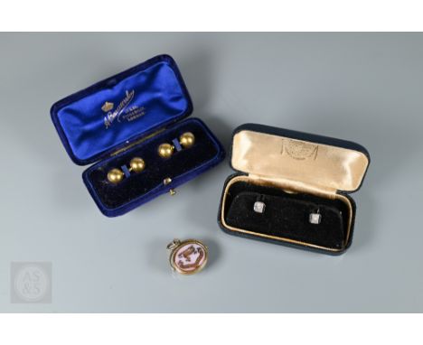 A pair of yellow gold cufflinks stamped 14 in the form of ball and baton, approx 4.5g (cased) to/w pair of 9ct studs with mot