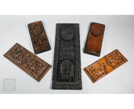A 19th century Irish ebonised oak large book-slide, carved with a harp, shamrock and castle ruins - 'Castleross' and 'Muckros