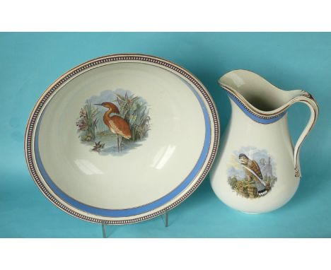 An impressive wash jug and basin: Bird Subjects, lined in blue, jug 310mm, star crack to underside of bowl (2) (Prattware, po