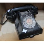 A vintage Bakelite call exchange telephone