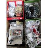 Four small boxes containing a quaintly of Lemax electrical lights etc