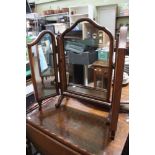 A triple wooden dressing table mirror