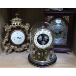 A Georgian design bracket clock with two other decorative mantle clocks