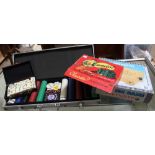 A selection of games to include dominoes, etc