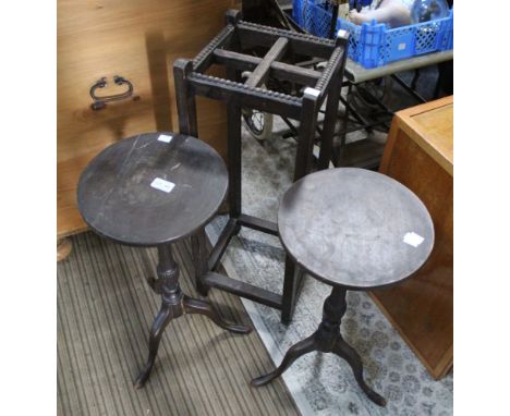 An umbrella / stick stand, together with two small circular tables