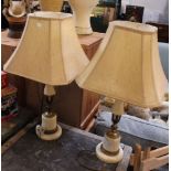 A pair of onyx based table lamps