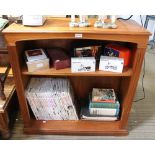 A modern low hard wood bookcase