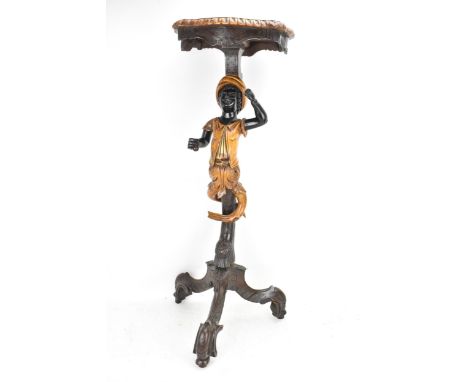 A late 19th/early 20th century Italian blackamoor ebonised torchere bust/plant stand, shaped top with carved detailing to the