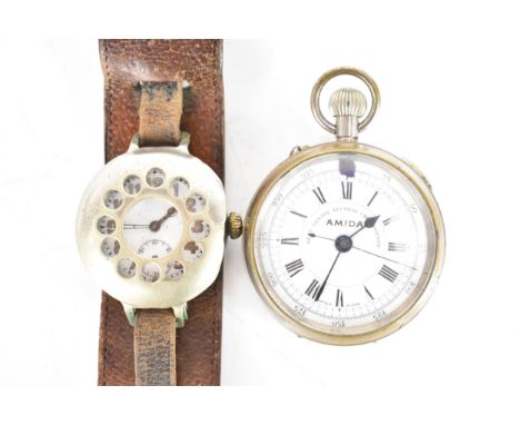 A First World War, manual wind, silver cased trench watch, having a shrapnel guard, white enamel dial with subsidiary seconds