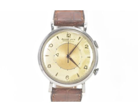 A Jaeger LeCoultre Memovox, alarm, automatic, gents, stainless steel wristwatch, the two tone dial having an alarm selection 