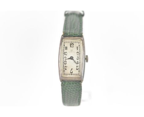 An Art Deco Omega, manual wind, ladies wristwatch, circa 1930-34 the silvered rectangular dial having Arabic numerals, green 