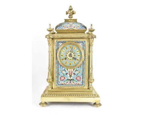 A late 19th century Maple & Co French champleve enamel mantle clock, the case of architectural form with turned finials, four