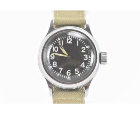 An Elgin A-11 U.S Army military issue, manual wind, gents wristwatch, circa 1940s, the black dial having Arabic numerals and 