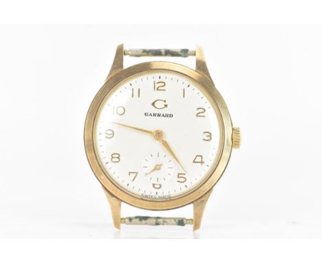 A Garrard, manual wind, gents, 9ct gold wristwatch, the silvered dial having Arabic numerals with a subsidiary seconds dial a