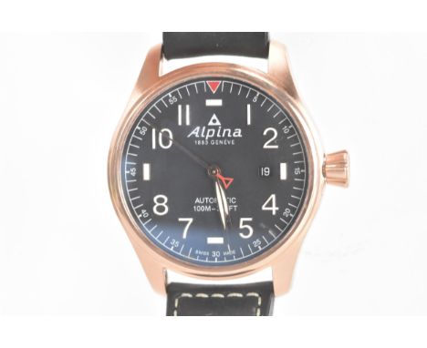 An Alpina Startime, automatic, gents, rose gold coloured case wristwatch, having a black dial with centre seconds and date ap
