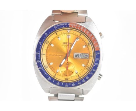 A Seiko Pogue, chronograph, automatic, gents, stainless steel wristwatch, circa 1970s, having a yellow dial, subsidiary secon