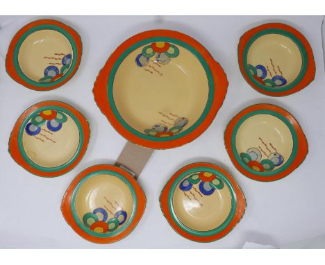 Six Art Deco ceramic plates and matching bowl by Edna Best for Lawleys, one plate restored 