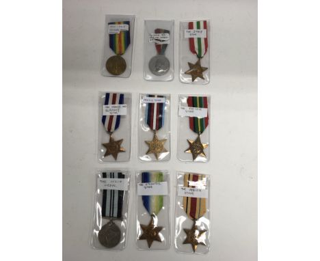 A collection of 9 loose medals including First World War examples