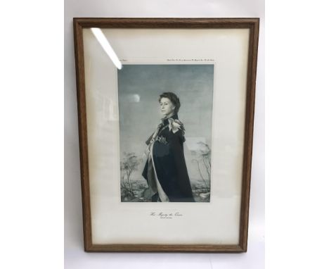 A framed and glazed print portrait of Her Majesty The Queen by Pietro Annigoni.