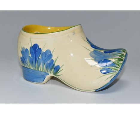 A CLARICE CLIFF SMALL SABOT/CLOG, in Blue Crocus pattern, painted with the blue flowers on the toe and sides of the sabot, wi