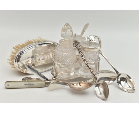 A SMALL ASSORTMENT OF SILVER ITEMS, to include a three piece cruet set with stand, comprising of a glass salt pot, mustard wi