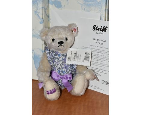 A BOXED STEIFF LIMITED EDITION 'TEDDY BEAR VIOLET', no.677625, limited edition no.902/1500, cream mohair, wearing Liberty pri