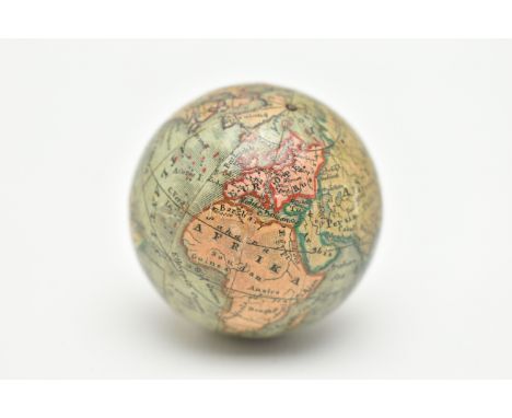 A 19TH CENTURY GERMAN MINIATURE POCKET GLOBE BY J G KLINGER, twelve printed paper gores, stamped 'The EARTH published by J.G.