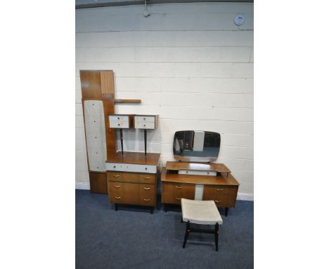 A MID CENTURY TEAK BEDROOM SUITE, comprising a double door wardrobe, with a central mirror, width 126cm x depth 52cm x height