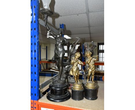 A GROUP OF BRONZED SPELTER FIGURES AND LAMP, comprising a pair of gilt musician figures impressed marks to base 'Kossowski', 