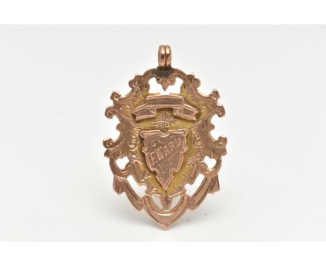 A LATE VICTORIAN 9CT GOLD FOB MEDAL, shield shape with engraved monogram, engraved to the reverse 'Winners M.R.F.L 1895-9', h