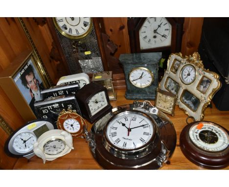 A COLLECTION OF LATE 19TH CENTURY AND MODERN CLOCKS AND A BAROMETER, including an American Jerome &amp; Co mantel clock with 