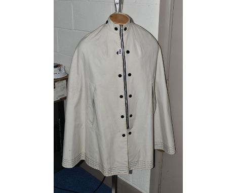 AN ICONIC VINTAGE 1960'S MARY QUANT 'ALLIGATOR' CAPE, one size fits all ivory coloured cape, 100% cotton, a 1960's collaborat