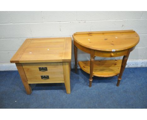 A DUCAL PINE DEMILUNE SIDE TABLE, with a single drawer, on turned and tapered legs, united by an undershelf, width 90cm x dep