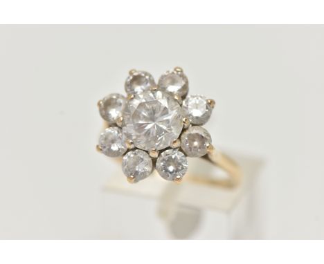 A 9CT GOLD CUBIC ZIRCONIA CLUSTER RING, the circular cubic zirconia in claw settings, 9ct hallmark, ring size N, approximate 