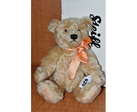 A BOXED STEIFF ROYAL WEDDING OF WILLIAM AND CATHERINE TEDDY BEAR, no.662713, ltd edit no.2106, golden mohair, height 25cm, wi