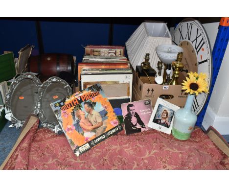 FOUR BOXES OF MISCELLANEOUS SUNDRIES, to include a small Laura Ashley red and gold coloured rug, two 'Past Times' mirrors, tw