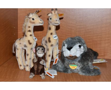 A GROUP OF STEIFF ANIMALS, comprising 'Jocko' Chimpanzee 040542,height 10cm, two 'Greta' Giraffe 068058, height 22cm, togethe