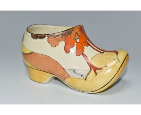 A CLARICE CLIFF SMALL SABOT/CLOG, in Coral Firs pattern, painted with coral, orange and brown stylised trees in a landscape, 