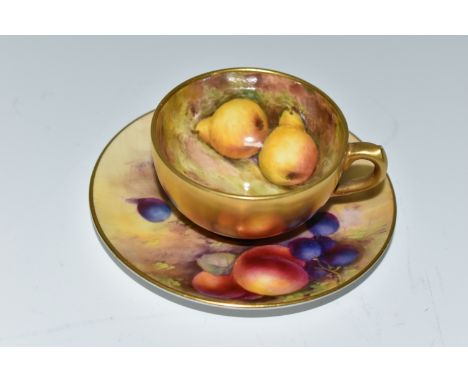 A ROYAL WORCESTER FALLEN FRUITS SMALL TEACUP AND SAUCER, the cup with gilt exterior, interior painted with pears and damsons 