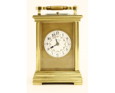 A repeating brass carriage clock, early 20th century, the enamel dial decorated with hand-painted floral swags, fitted gong s