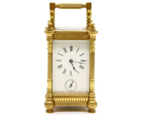 A late 19th/early 20th century French brass carriage clock, with alarm dial, 16cm high