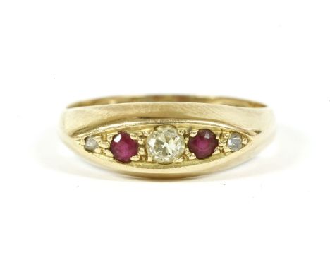 A 18ct gold five stone graduated diamond and ruby boat shaped ring, to a plain polished shank, 1919, 2.39g