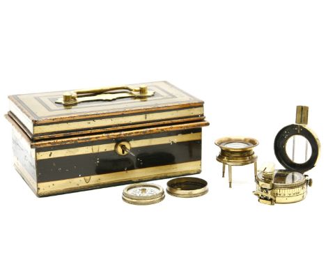 A painted metal strong box with brass pocket compass, magnifier and military prism compass