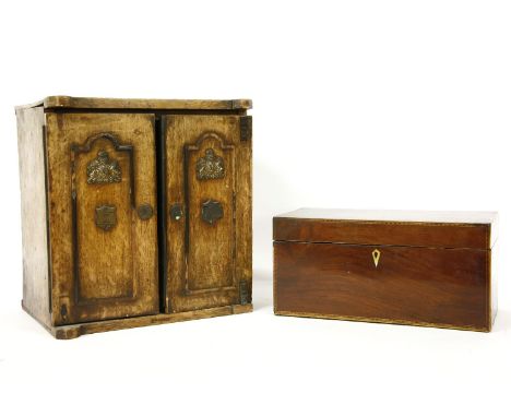 A George III inlaid mahogany tea caddy, 30cm x 15cm x 15cm and an oak smokers companion, small gilt mirror, and marquetry pan