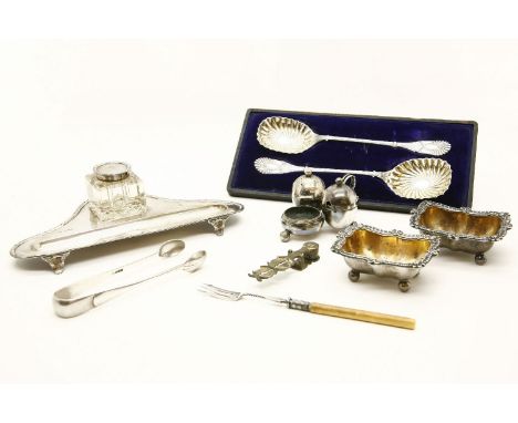 A silver inkwell/pen stand, together with a pair of plated salts, a pair of silver sugar tongs, and a pickle fork, etc. 5toz