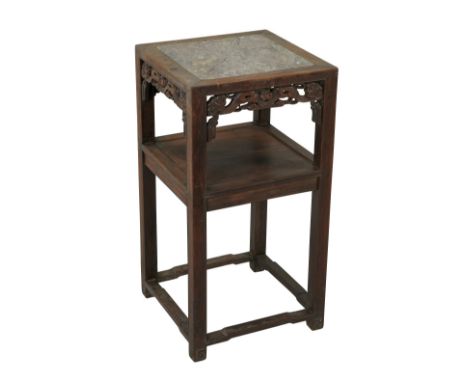 Chinese rosewood stand with a square marble insert along the top. The stand with one shelf and a skirt with pierced naturalis